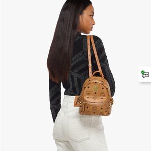 Authentic MCM Stark Bebe Boo Side Studs Backpack in Visetos